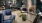 a living room with a glass door to private balcony
