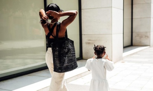 The essence of exceptional living a woman walking with her child