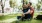 two men sitting in a park